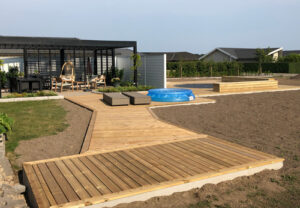 A big and beautiful wooden deck made by a GroundPlug® client.