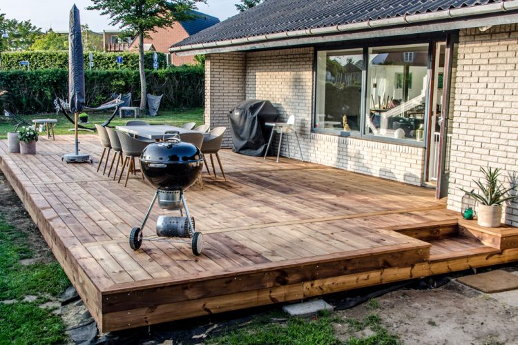 Cozy wooden deck with build in steps.