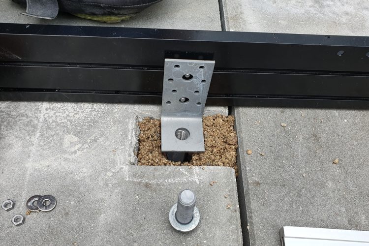 How a GroundPlug® Screw Pile with L-bracket looks, right before the washer and bolt is installed.